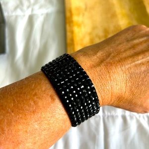 Sparkly band bracelet with magnetic closure.